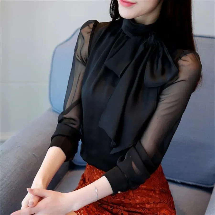 Elegant blouse with bow and semi-sheer sleeves