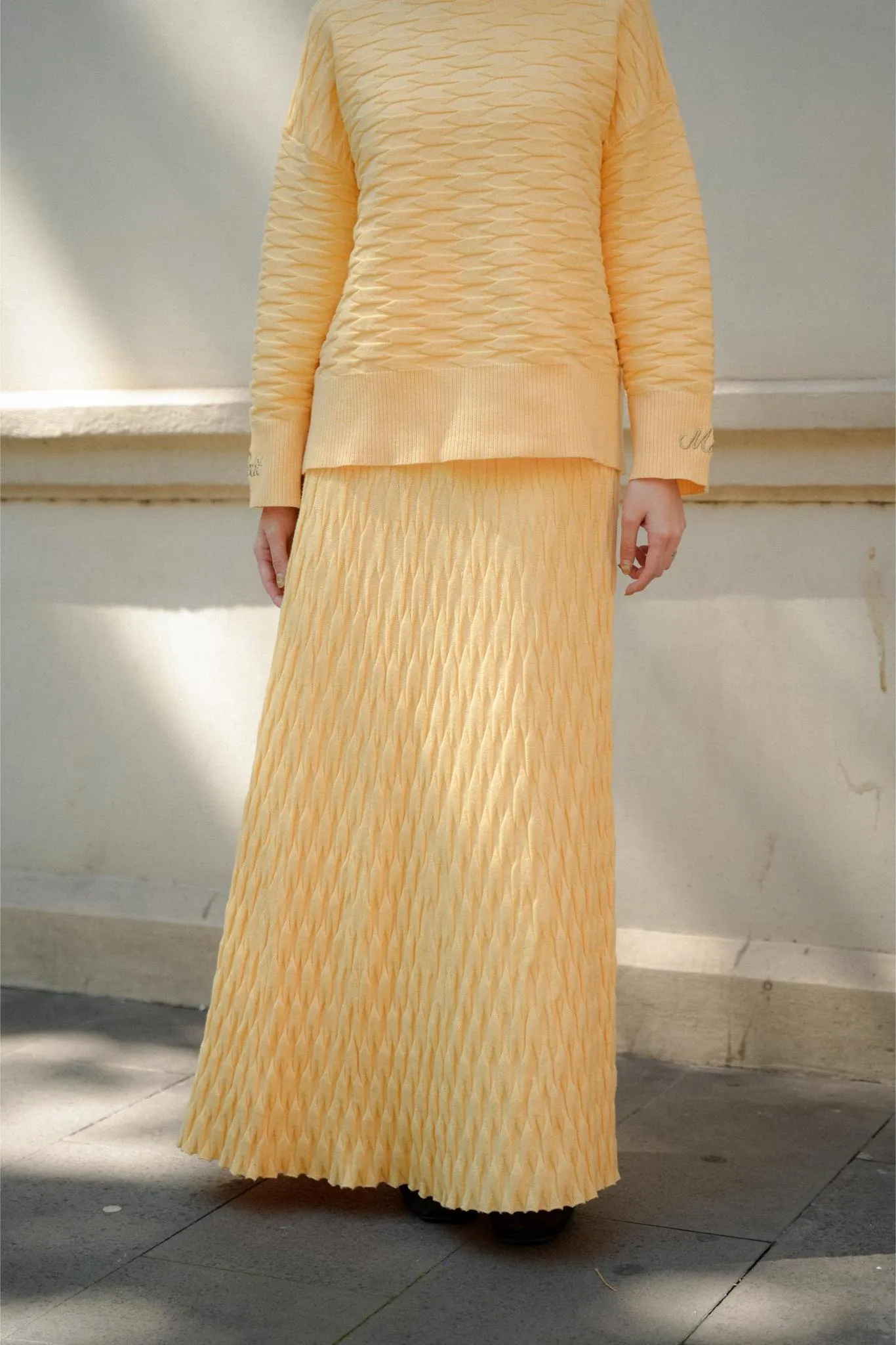 NUVOLA KNIT SKIRT IN BUTTER