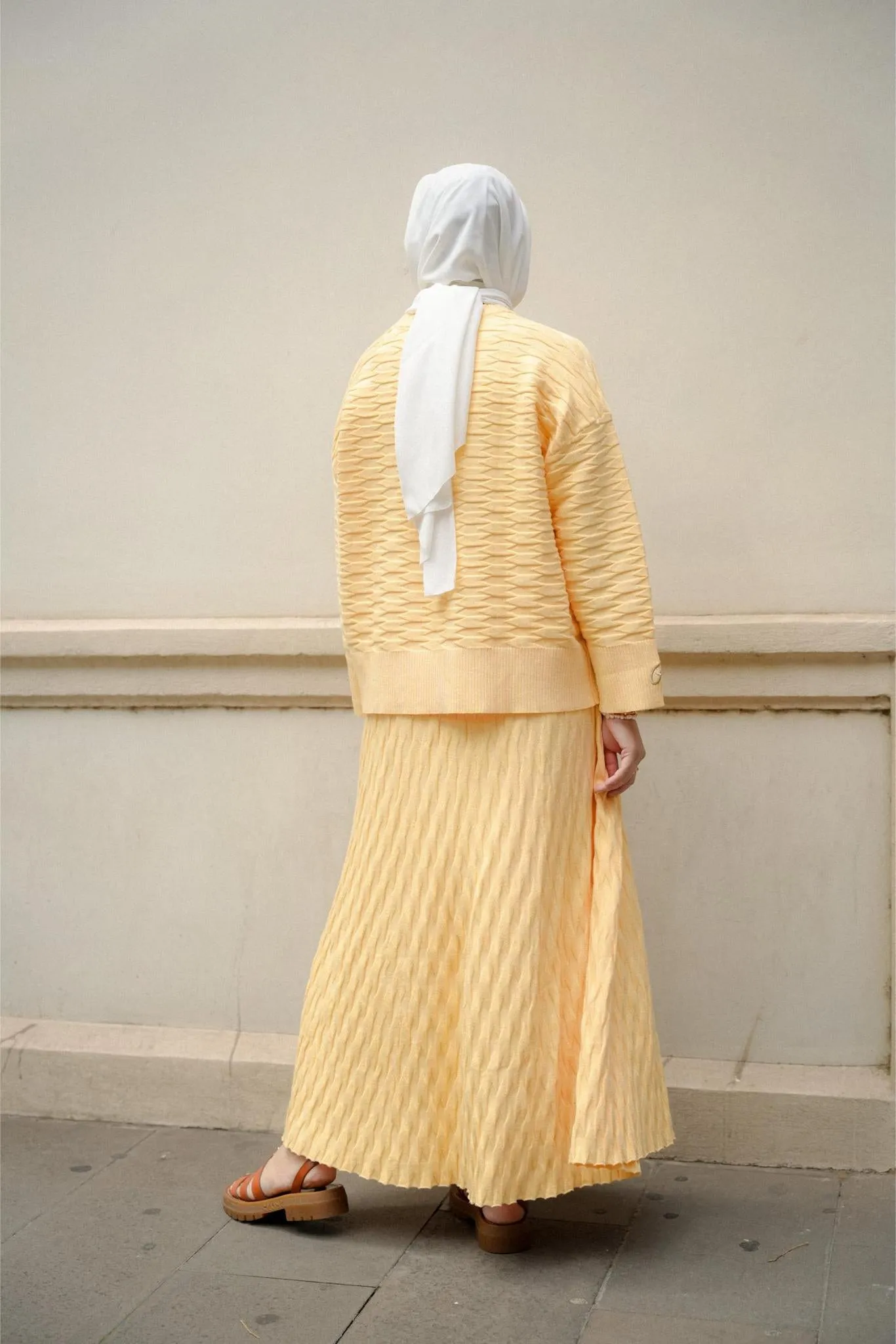 NUVOLA KNIT SKIRT IN BUTTER