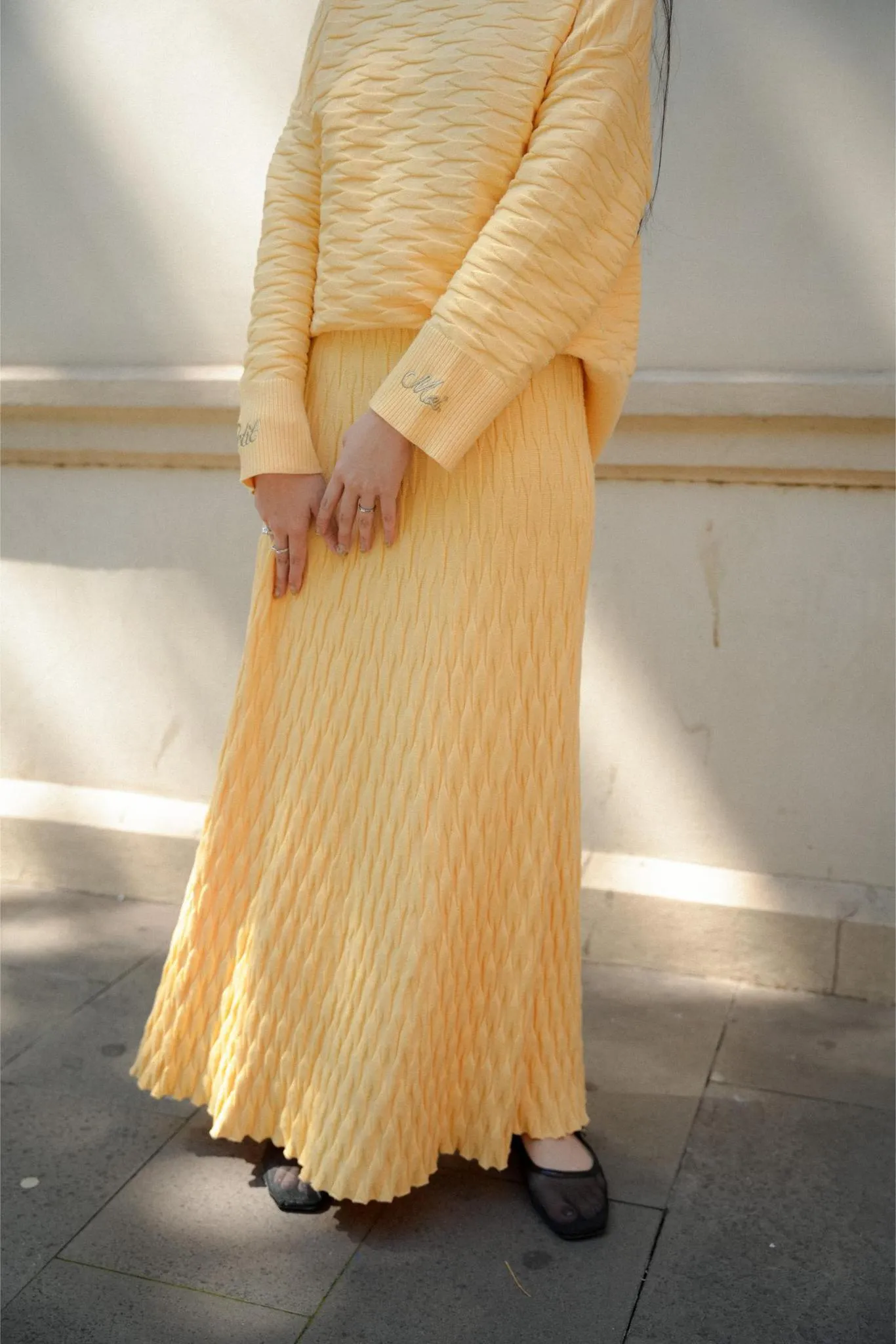 NUVOLA KNIT SKIRT IN BUTTER