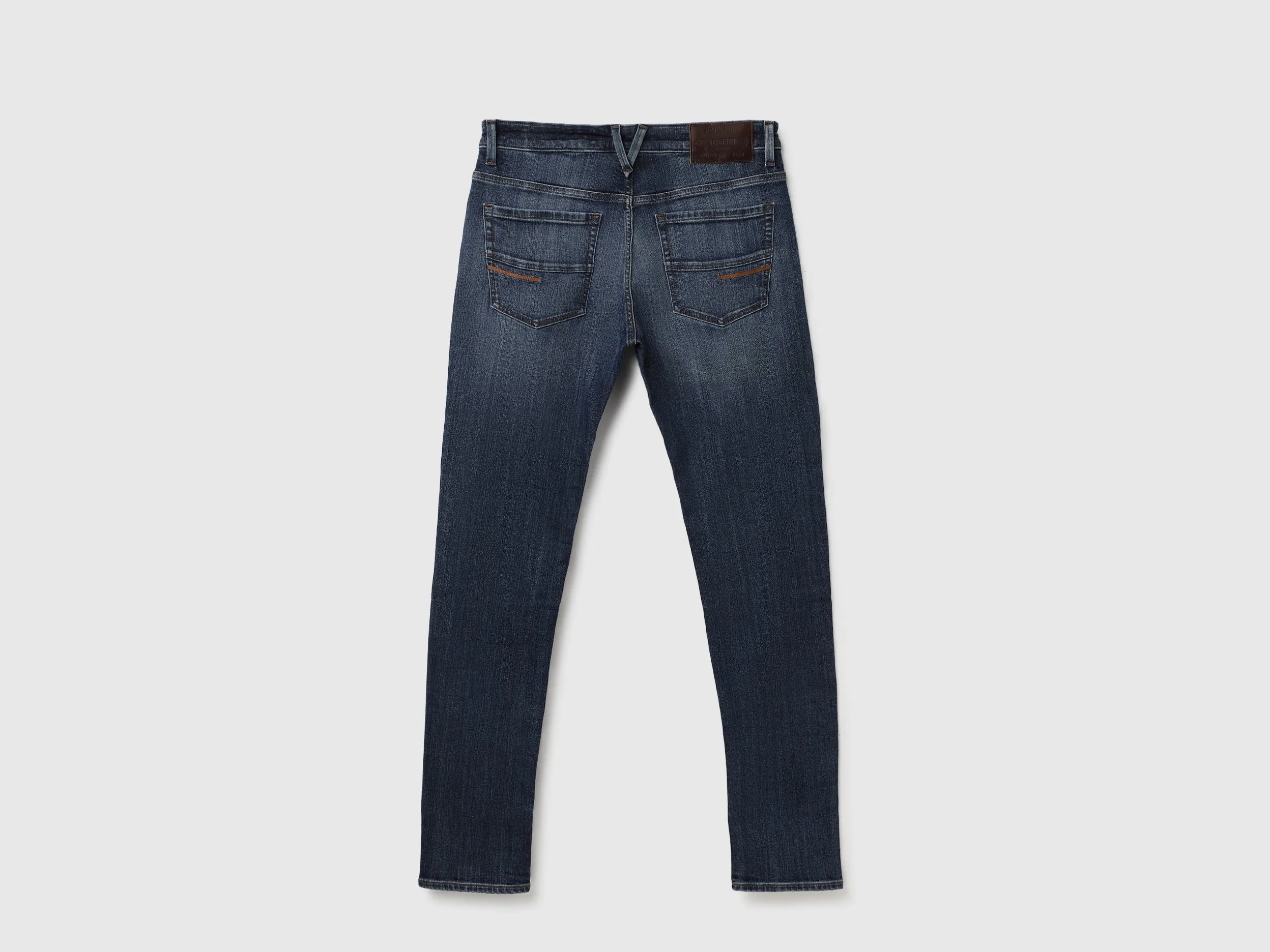 Solid Mid Rise Slim Tapered Fit Jeans