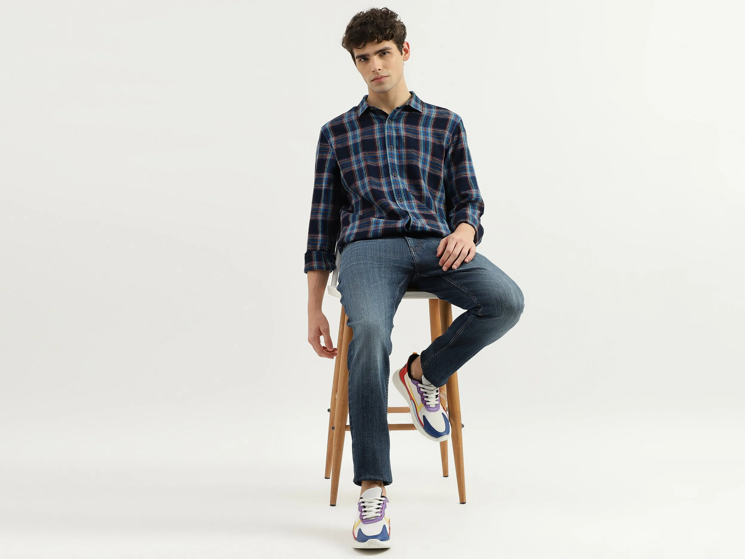 Solid Mid Rise Slim Tapered Fit Jeans